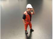 AT-Collections | Diorama items Diorama items | ADF32143 | 1/32 | Pascal has a headache.Orange safety jacket with helmet | 